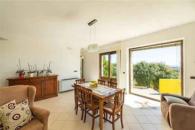Ferienhaus mit Garten und Klimaanlage