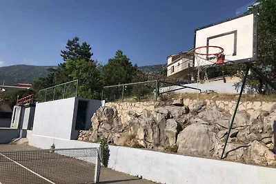 Ferienwohnung mit Poolnutzung und Meerblick