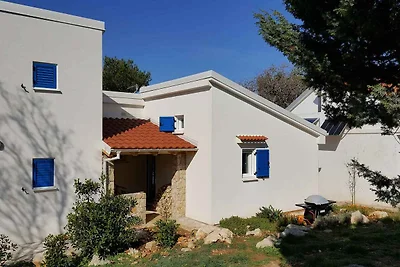 Ferienhaus mit Garten und Meerblick