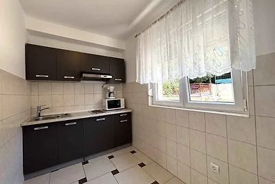 Ferienwohnung mit Pool und Meerblick