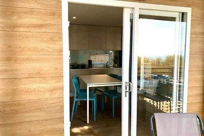 Mobilehome mit Terrasse mit Seeblick, Pool un