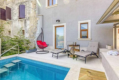 Ferienhaus mit beheiztem Privatpool