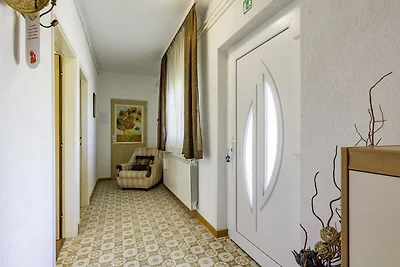 Ferienwohnung mit Garten und Klimaanlage