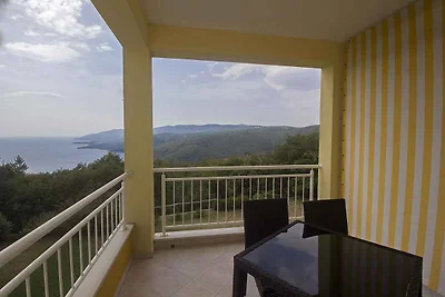 Ferienwohnung mit einen Balkon und Meerblick