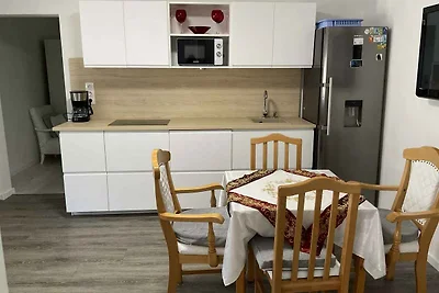Ferienhaus mit Waschmaschine und Ofen im