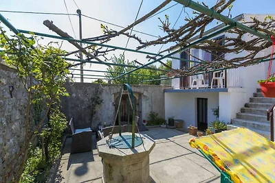 Ferienhaus mit Balkon und Klimaanlage
