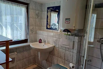Ferienhaus mit Kinderschaukel und