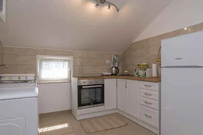 Ferienwohnung Tia B4