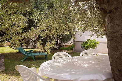 Ferienwohnung mit einer überdachten Terrasse