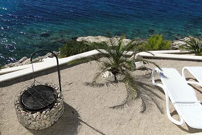 Ferienwohnung mit Pool und Meerblick