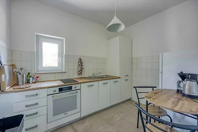 Ferienhaus mit Whirlpool und eingezäuntem