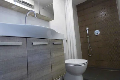 Studio mit Gemeinschaftsterrasse und Grill