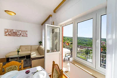 Ferienhaus mit Pool und Meerblick