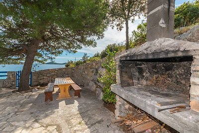 Ferienhaus mit Garten und Meerblick