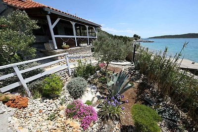 Ferienhaus mit Garten und Meerblick