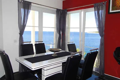 Ferienwohnung mit Poolnutzung und Meerblick