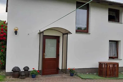 Ferienhaus mit Kinderschaukel und