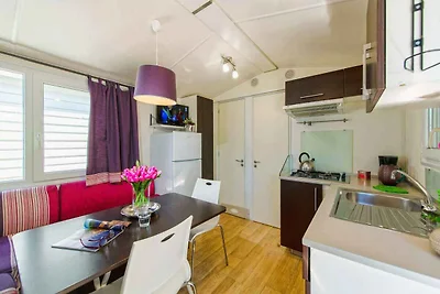 Mobilehome mit Klimaanlage und Holzveranda