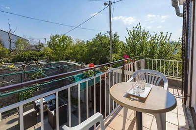 Ferienhaus mit Balkon und Klimaanlage