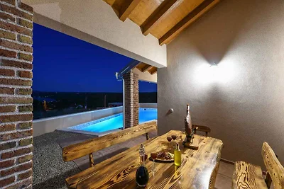 Ferienhaus mit Meerblick und Pool