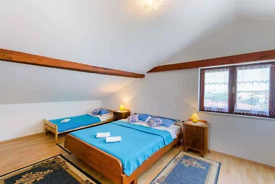 Ferienwohnung mit gemeinsamer Terrasse und
