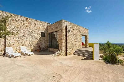 Ferienhaus mit Garten und Klimaanlage