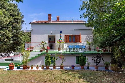 Ferienhaus mit Garten, Grill und