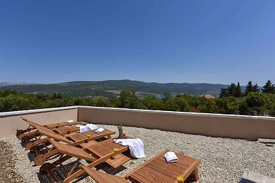 Ferienhaus mit Meerblick und Pool