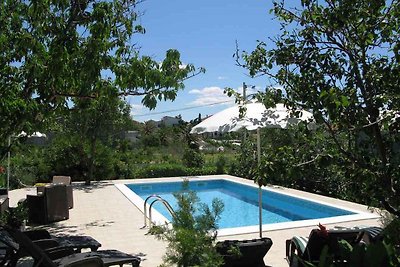 Ferienwohnung mit Aussenpool und Meerblick