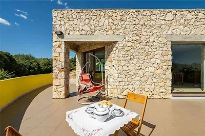 Ferienhaus mit Garten und Klimaanlage