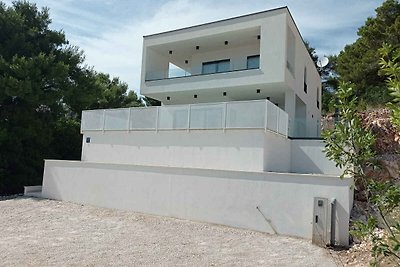 Ferienhaus mit Pool und Meerblick