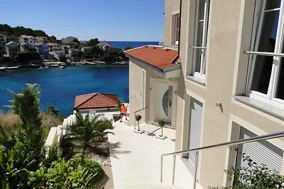 Ferienwohnung mit Poolnutzung und Meerblick