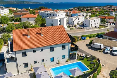 Ferienwohnung mit Pool und Meerblick