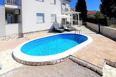 Ferienwohnung mit Swimmingpool in Strandnähe