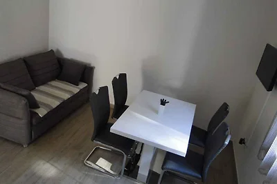 Ferienwohnung mit Terrasse 200 m vom Strand