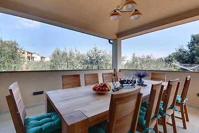 Ferienhaus mit Terrasse und Klimaanlage