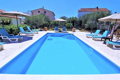 Ferienhaus mit Aussenpool und Fitness