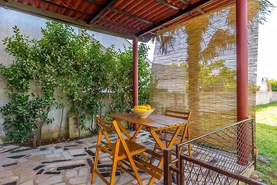 Ferienhaus mit Klimaanlage und Garten