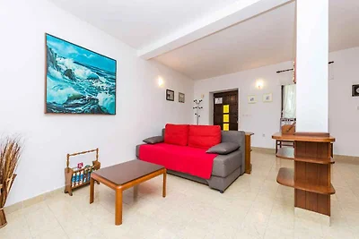 Ferienhaus mit Garten und Klimaanlage