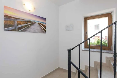 Ferienwohnung mit Meerblick und Terrasse