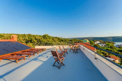 Appartamento Vacanza con famiglia Supetarska Draga