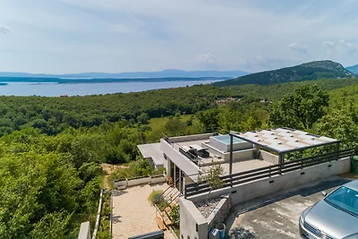 Ferienhaus mit Pool und Meerblick