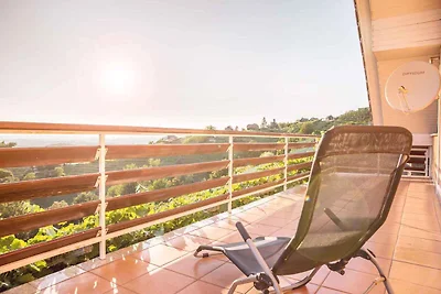 Ferienhaus mit Terrasse und Klimaanlage