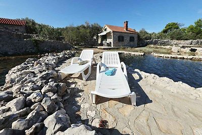 Ferienhaus mit Gartenterrasse und Bootsteg