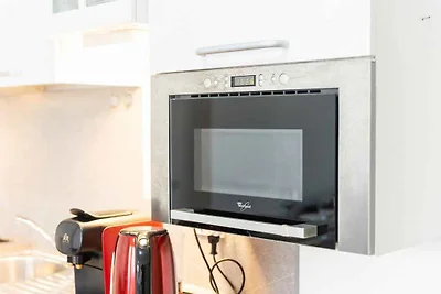 Studio mit Klimaanlage und Balkon