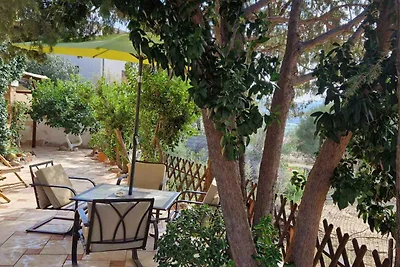 Ferienhaus mit Garten und Klimaanlage