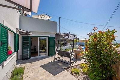 Ferienhaus mit Pool und Meerblick