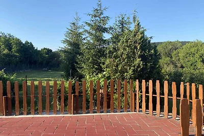 Ferienhaus mit Schaukel und Gartendusche