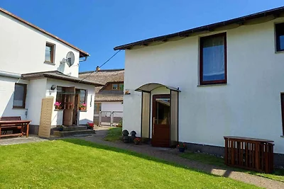 Ferienhaus mit Kinderschaukel und