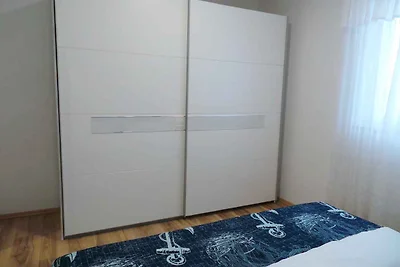 Ferienwohnung mit Pool und Meerblick